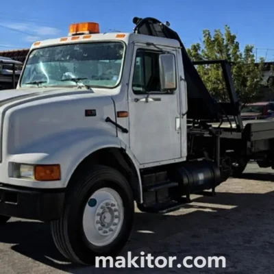 Camión International 1999 466 Navistar con grúa HIAB 3 toneladas y plataforma deslizable – 100% mexicano